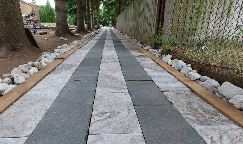 Wampum pathway with light and dark grey stones